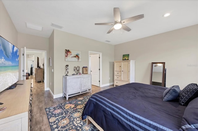 bedroom with ceiling fan and dark hardwood / wood-style floors