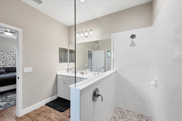 bathroom with vanity and walk in shower