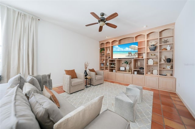 living room featuring tile patterned floors and ceiling fan