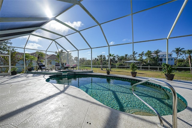 view of pool featuring a lanai, an in ground hot tub, and a patio