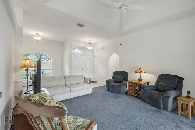 living room with carpet flooring and ceiling fan