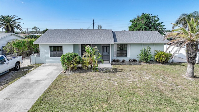 ranch-style house with a front yard