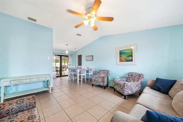 tiled living room featuring french doors, vaulted ceiling, and ceiling fan