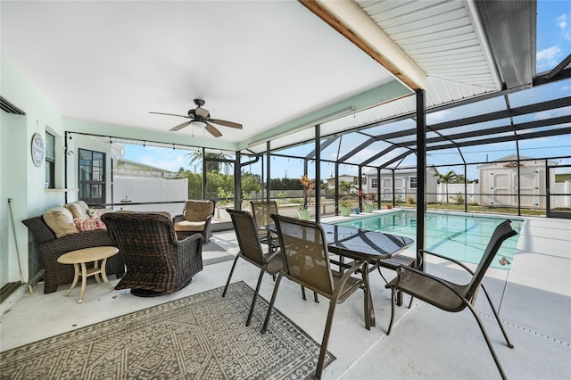 exterior space featuring a lanai, ceiling fan, an outdoor hangout area, and a storage unit