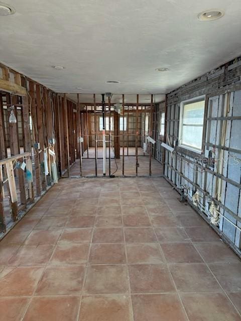 miscellaneous room featuring tile patterned flooring