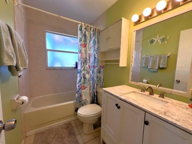 bathroom featuring shower / tub combo with curtain, vanity, toilet, and tile patterned floors