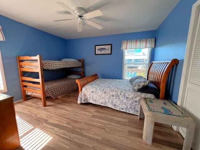 9526 Jolly Roger Trl, Placida, FL 33946 - bedroom featuring wood finished floors and a ceiling fan