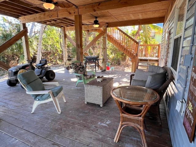 9526 Jolly Roger Trl, Placida, FL 33946 - deck with ceiling fan and stairs