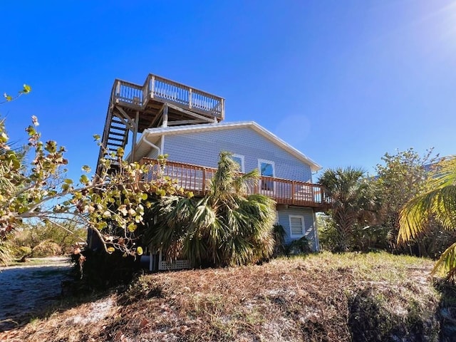 view of home's exterior with a deck