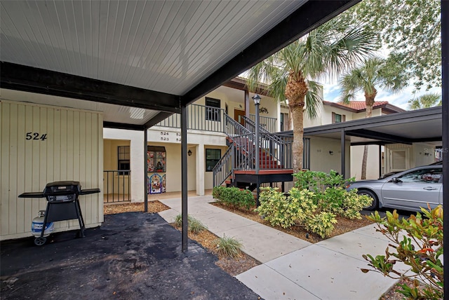 524 Pine Hollow Cir Unit 524, Englewood, FL 34223 - view of patio / terrace with stairway and grilling area