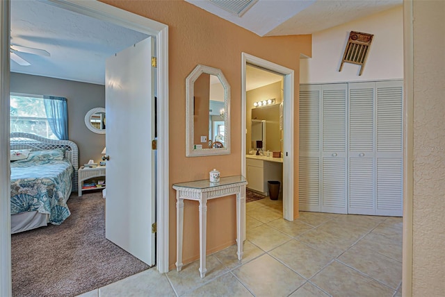 524 Pine Hollow Cir Unit 524, Englewood, FL 34223 - hallway with light tile patterned floors