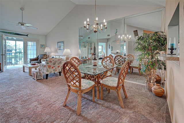 524 Pine Hollow Cir Unit 524, Englewood, FL 34223 - dining area featuring carpet, a chandelier, ceiling fan, and high vaulted ceiling