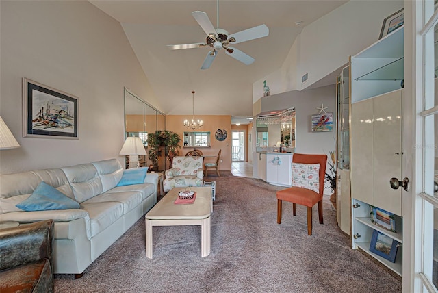 524 Pine Hollow Cir Unit 524, Englewood, FL 34223 - living room featuring carpet floors, ceiling fan, a chandelier, and high vaulted ceiling