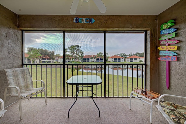 524 Pine Hollow Cir Unit 524, Englewood, FL 34223 - sunroom featuring a water view and a residential view