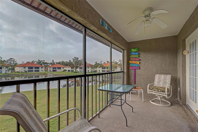 524 Pine Hollow Cir Unit 524, Englewood, FL 34223 - sunroom with a ceiling fan and a residential view