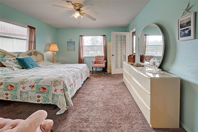 524 Pine Hollow Cir Unit 524, Englewood, FL 34223 - bedroom featuring carpet, ceiling fan, and french doors