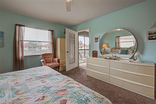 524 Pine Hollow Cir Unit 524, Englewood, FL 34223 - bedroom featuring dark carpet, multiple windows, access to exterior, and french doors