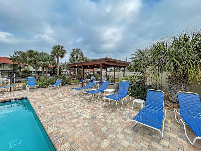 524 Pine Hollow Cir Unit 524, Englewood, FL 34223 - community pool featuring a gazebo and a patio