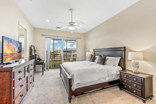 bedroom featuring access to exterior, light colored carpet, vaulted ceiling, and ceiling fan