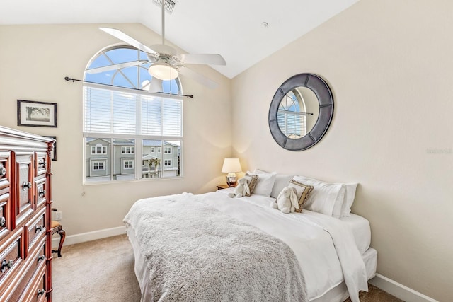 carpeted bedroom featuring ceiling fan and lofted ceiling