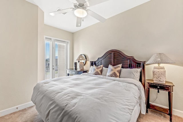 carpeted bedroom featuring access to outside, ceiling fan, and vaulted ceiling