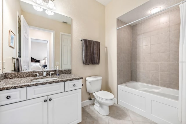 full bathroom featuring tile patterned floors, vanity, toilet, and shower / tub combo with curtain