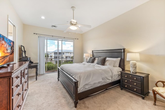 carpeted bedroom with access to exterior and ceiling fan