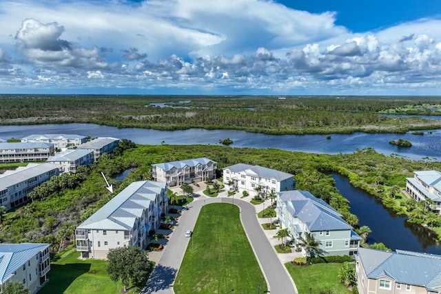 birds eye view of property featuring a water view