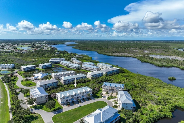 drone / aerial view with a water view