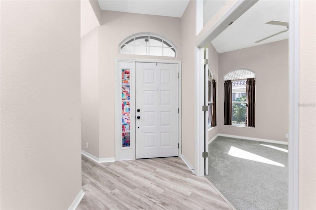 foyer with light hardwood / wood-style flooring