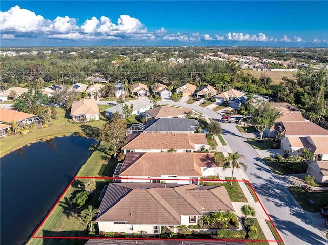 drone / aerial view featuring a water view