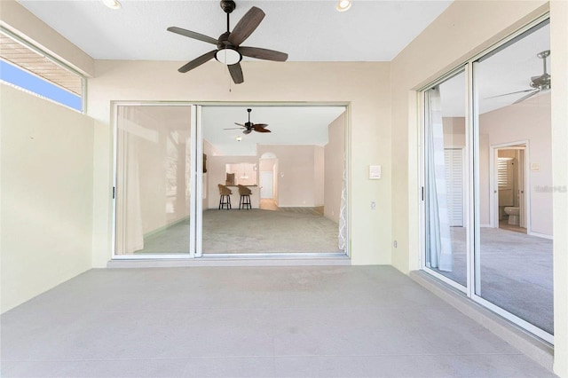 view of patio / terrace featuring ceiling fan