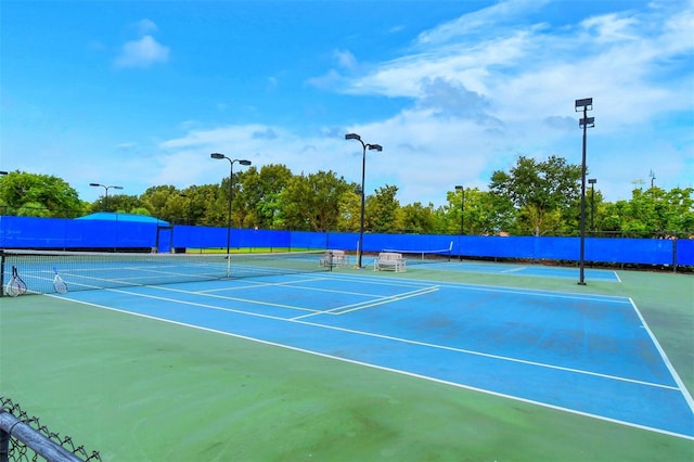 view of tennis court with basketball court