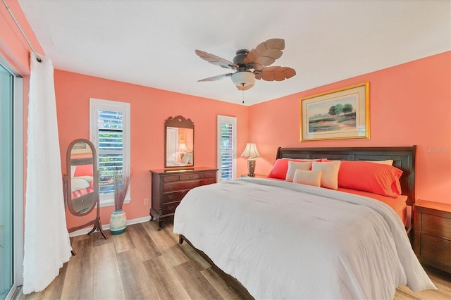 bedroom featuring ceiling fan and light hardwood / wood-style flooring