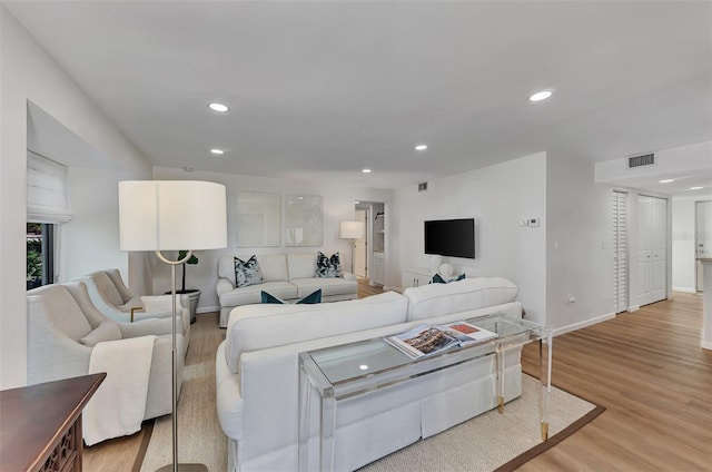 living room featuring light hardwood / wood-style flooring