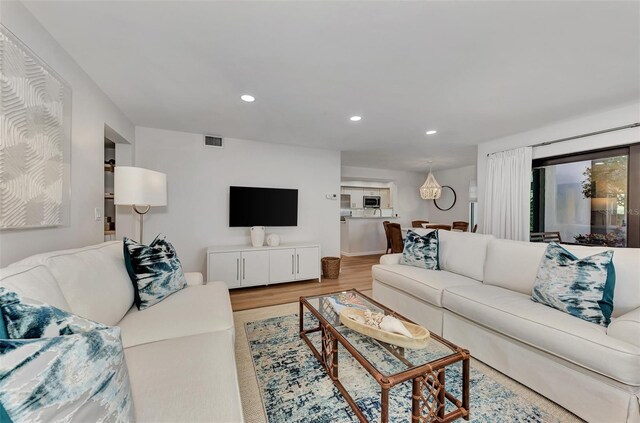 living room with hardwood / wood-style flooring