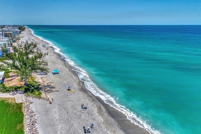 aerial view featuring a beach view and a water view