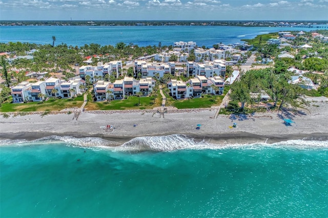 aerial view featuring a water view and a view of the beach