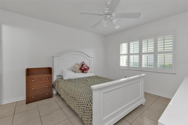 bedroom featuring light tile patterned floors and ceiling fan