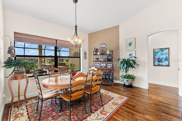 dining room featuring dark hardwood / wood-style flooring