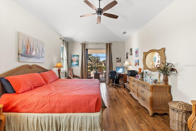 bedroom featuring access to outside, ceiling fan, and dark wood-type flooring