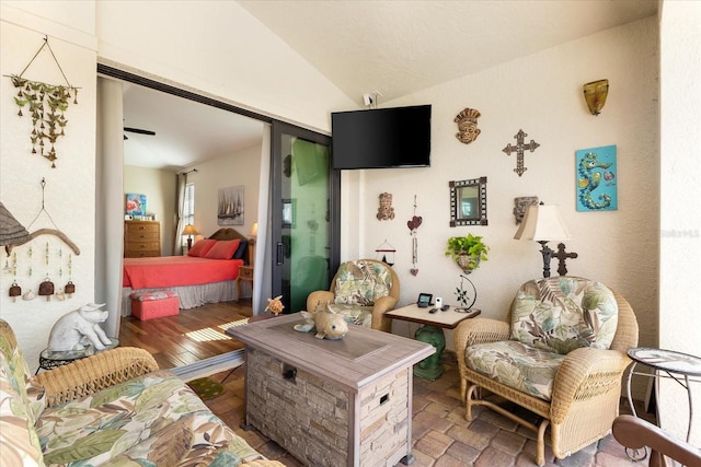 living room with lofted ceiling