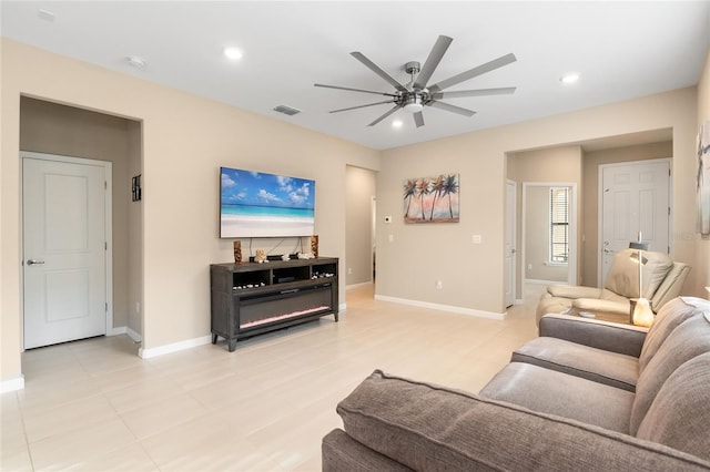 living room featuring ceiling fan