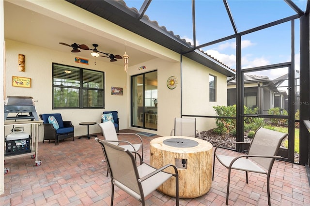 sunroom / solarium with ceiling fan