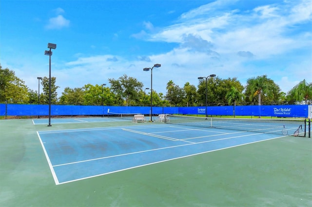 view of tennis court with basketball court