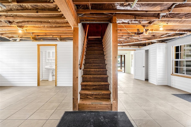 basement with wood walls