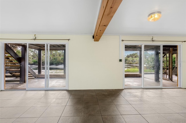 empty room with beam ceiling