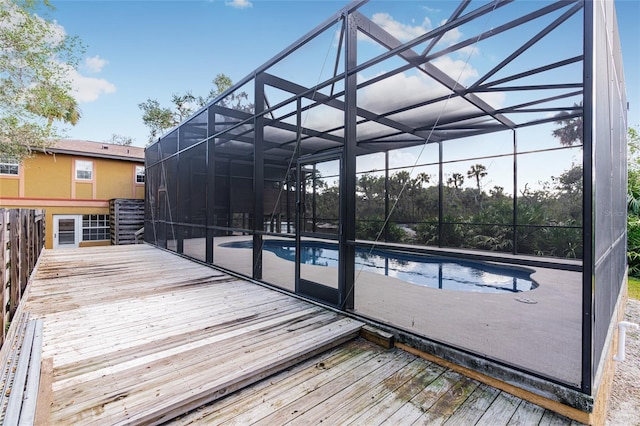 wooden deck with a lanai