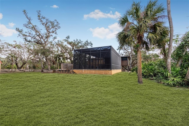 view of yard featuring a lanai