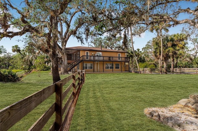 view of yard with a wooden deck